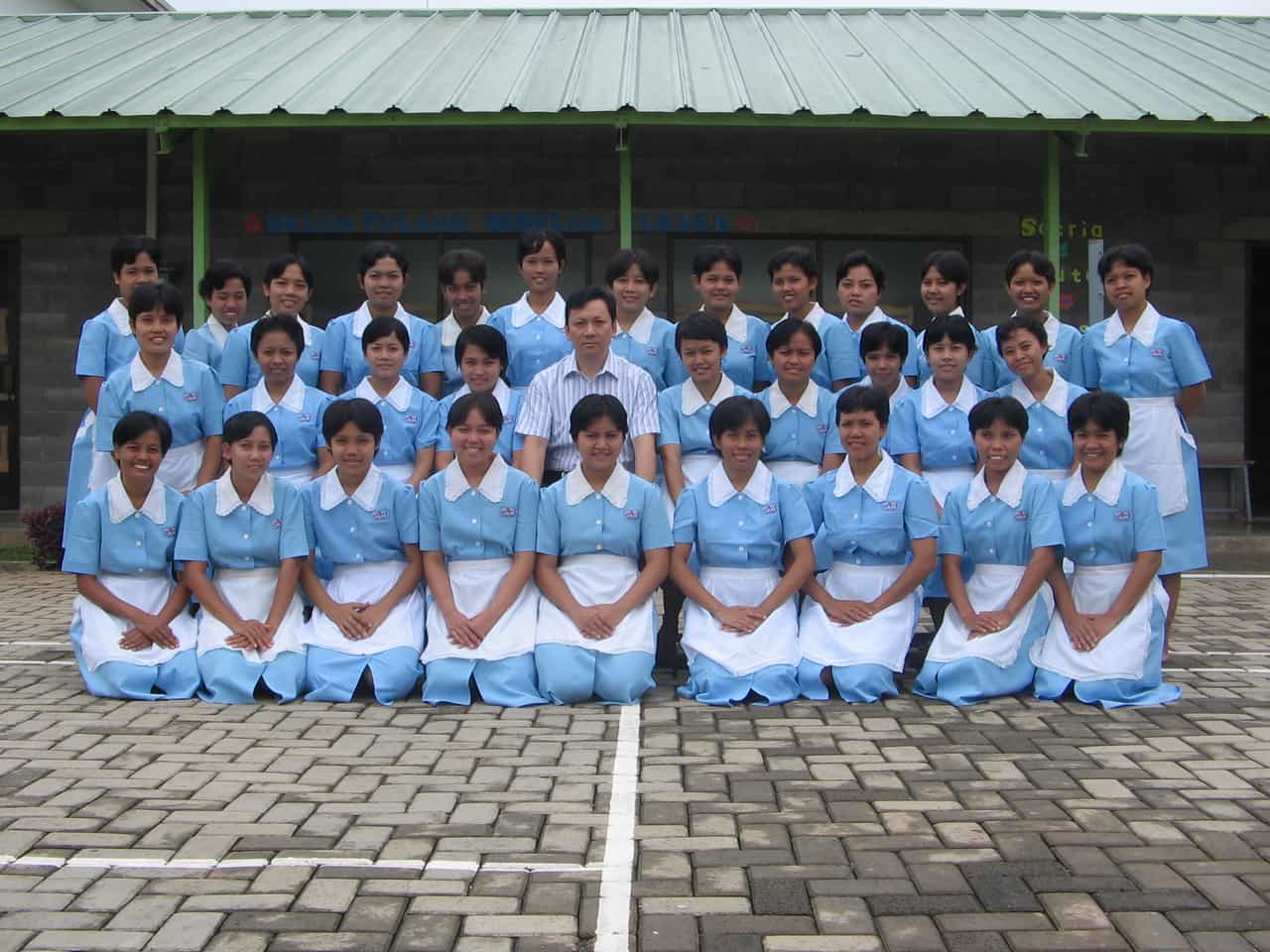 Group photo of helpers at an overseas training centre